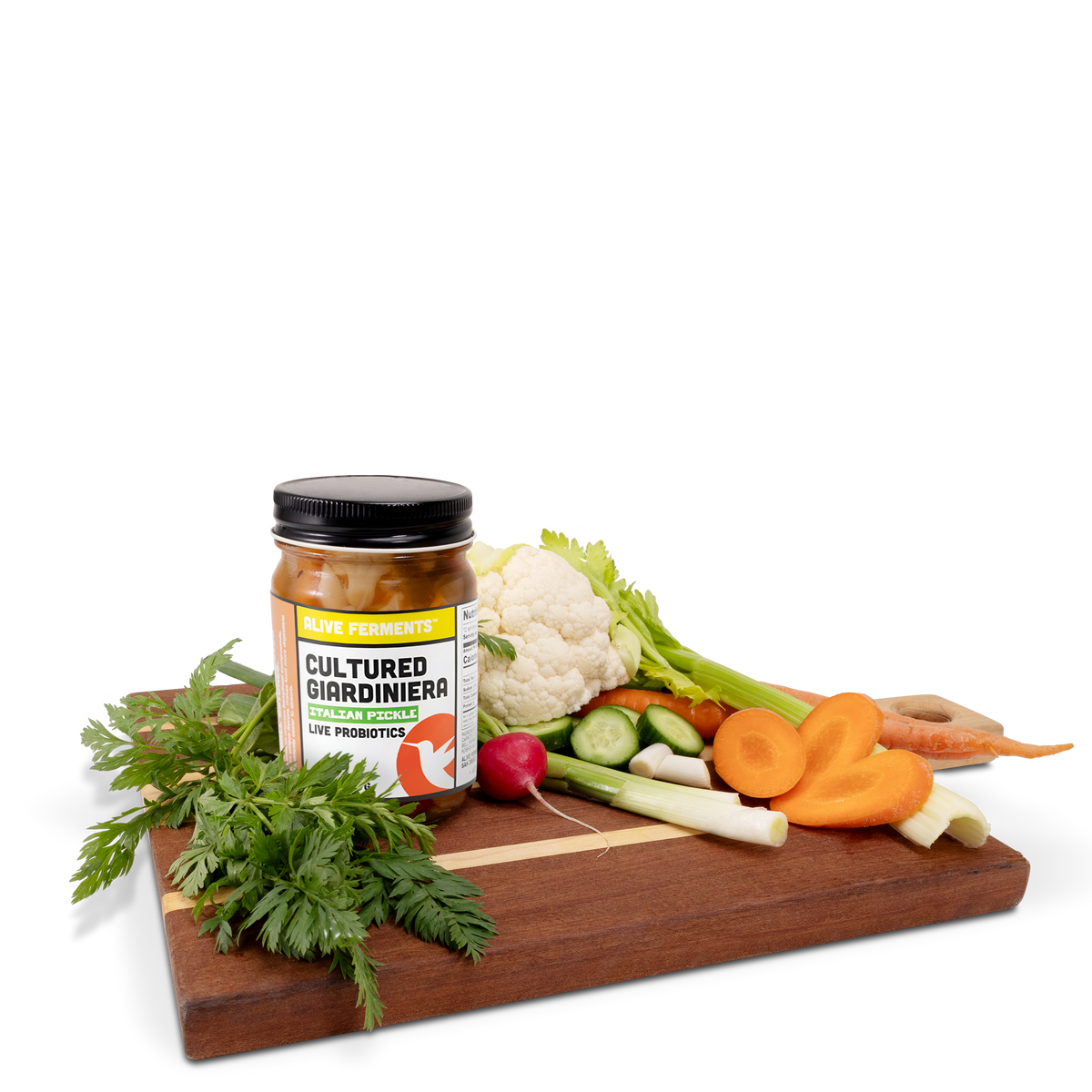 A jar of Giardiniera, a traditional Italian Pickle, on a wooden cutting board, surrounded by its ingredients: a colorful medley of fresh vegetables. 